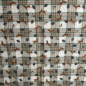 Hunters plaid tans, brown, and green colors with dog and bird print